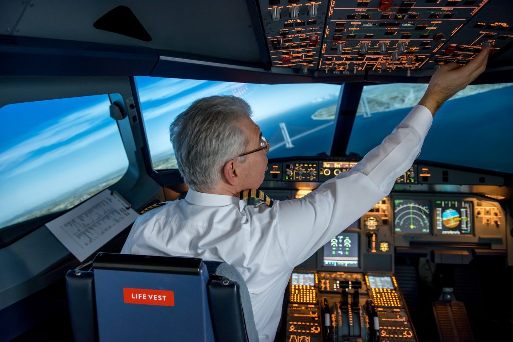 Pilot in cockpit simulator